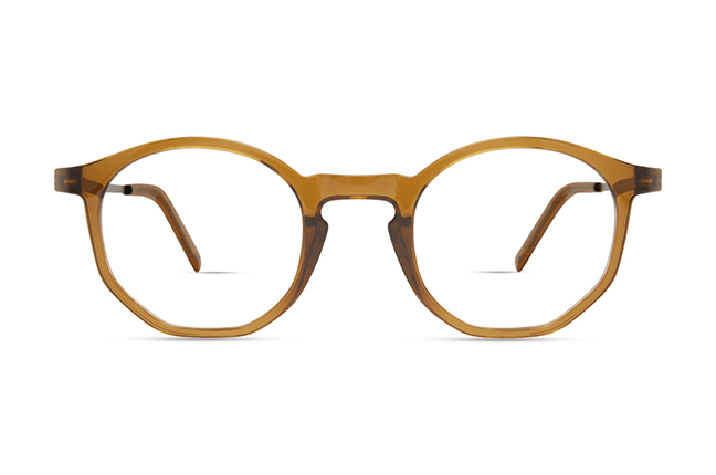 Il modello “7056” (nella colorazione “OLIVE”) degli occhiali Modo, appartenente alla collezione “R 1000 + TITANIUM”