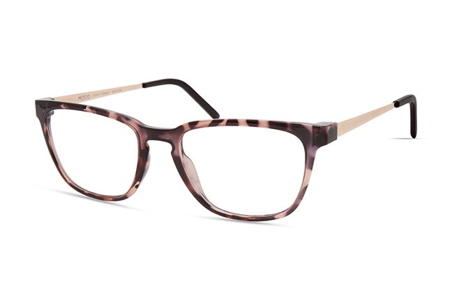 Il modello “7058” (nella colorazione “PINK TORT”) degli occhiali Modo, appartenente alla collezione “R 1000 + TITANIUM”