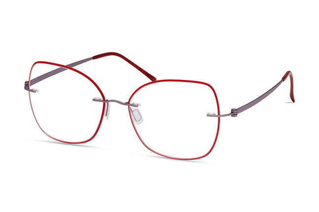 Il modello “4609D” (nella colorazione “RED LAVENDER EMBELLISHED”) degli occhiali Modo, appartenente alla collezione “PAPER-THIN RIMLESS”